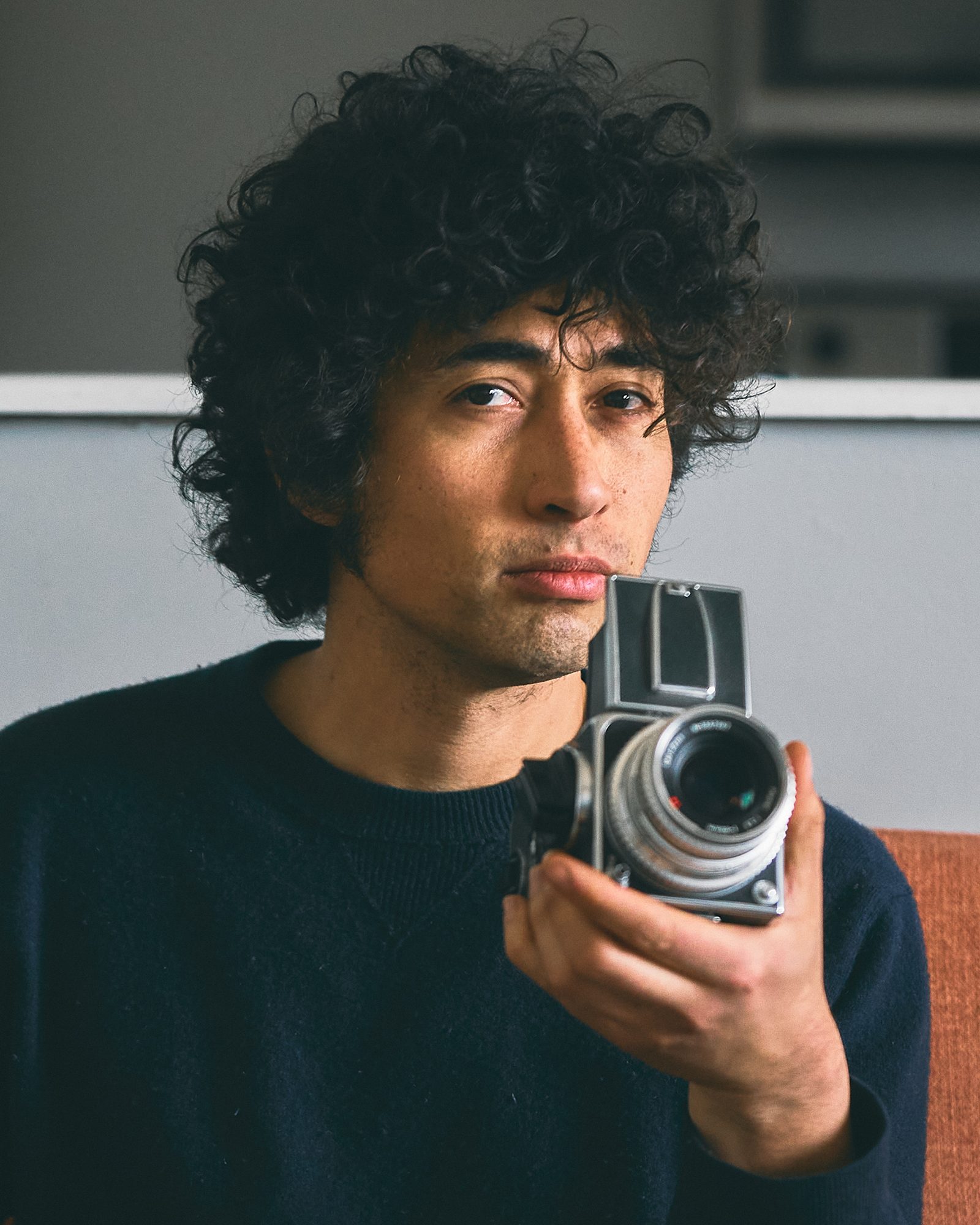 Calgary photographer Logan with Hasselblad medium format camera